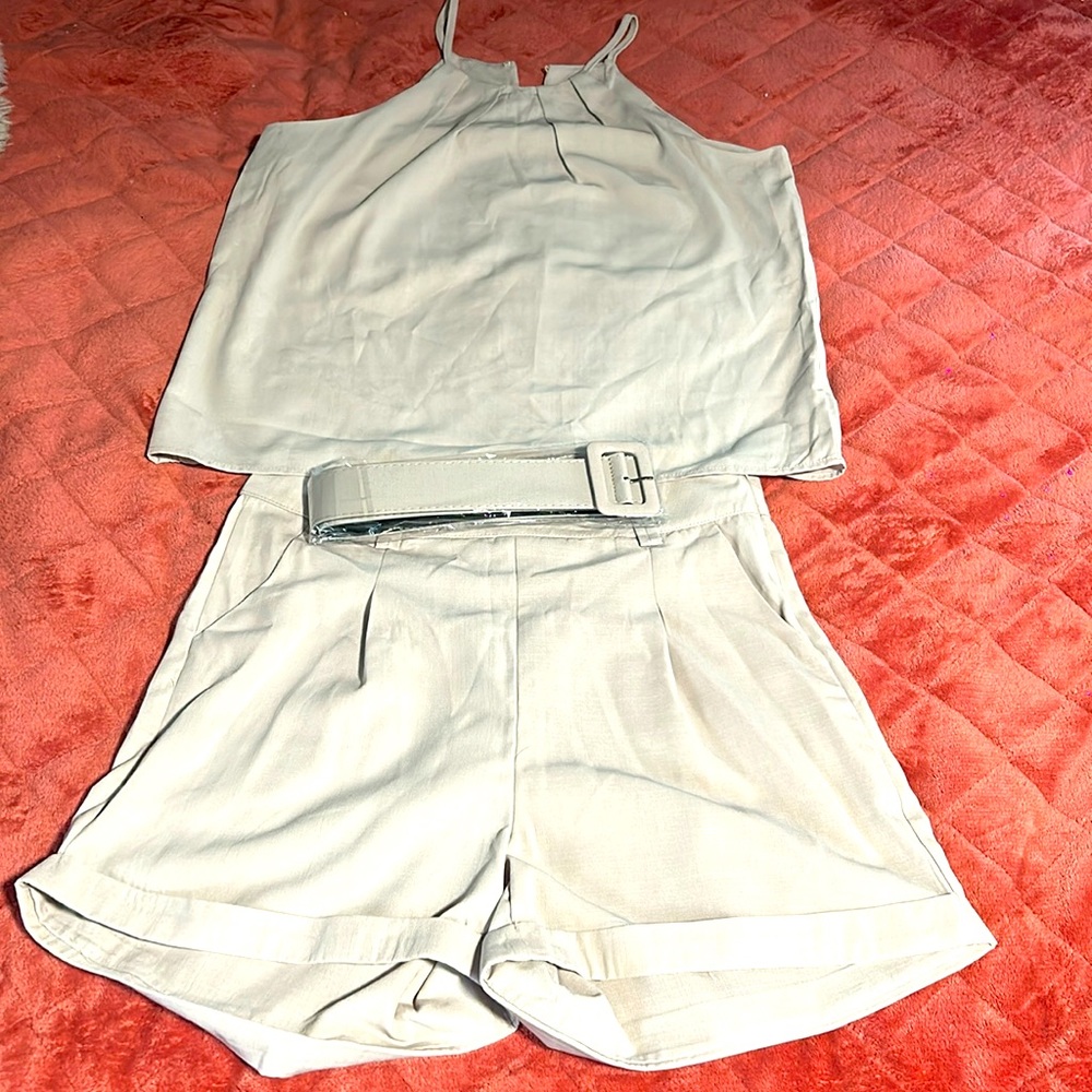 Very cute outfit, shorts, shirt and belt.